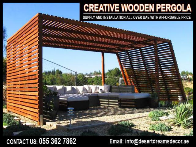 Walk way Area Pergola Uae | BBQ Pergola | Wall Attached Pergola Uae | Hardwood Pergola Dubai.