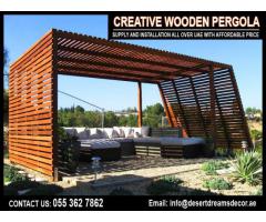 Walk way Area Pergola Uae | BBQ Pergola | Wall Attached Pergola Uae | Hardwood Pergola Dubai.