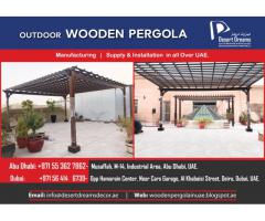 Seating area Pergola Dubai | Wall Attached Pergola Uae | Kids Play Area Pergola | Wooden Arbors Uae.