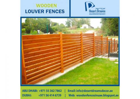 Wood Slatted Panels Installing in Uae | Natural Wood Finish Fence | Villa Privacy Fence Dubai.