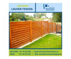 Wood Slatted Panels Installing in Uae | Natural Wood Finish Fence | Villa Privacy Fence Dubai.