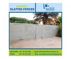 Wood Slatted Panels Installing in Uae | Natural Wood Finish Fence | Villa Privacy Fence Dubai.