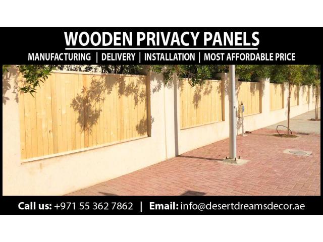 Wood Slatted Panels Installing in Uae | Natural Wood Finish Fence | Villa Privacy Fence Dubai.