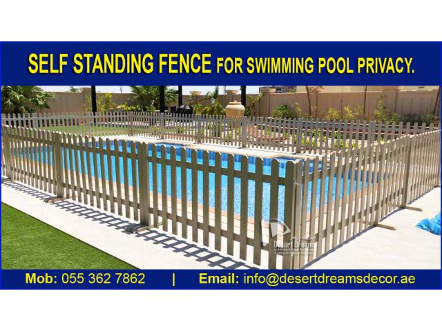 Outdoor Wooden Fence Uae | White Picket fence | Swimming Pool Privacy Fence Uae.