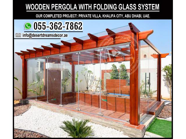 Glass Covered Pergola | Folding Glass System Pergola | Wooden Pergola Dubai.