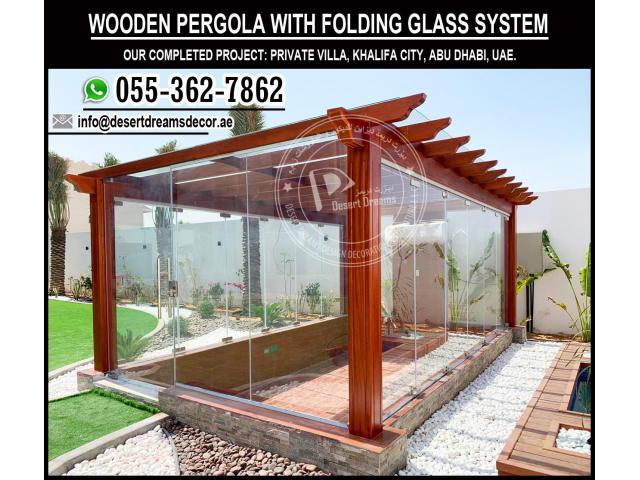 Seating Area Wooden Pergola | Glass Covered Pergola | Garden Pergola Uae.