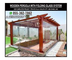 Seating Area Wooden Pergola | Glass Covered Pergola | Garden Pergola Uae.