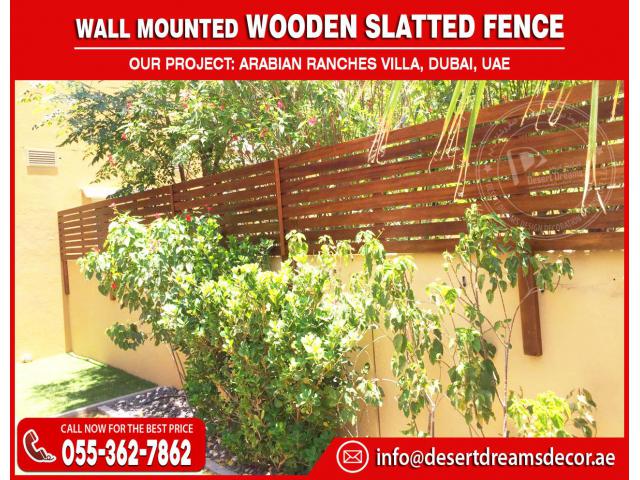 Wall Mounted Wooden Slatted Fence in Arabian Ranches Villas, Dubai, UAE.