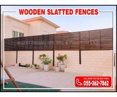 Wall Boundary Fences | Wall Mounted Fences | Wooden Slatted Fences in Uae.
