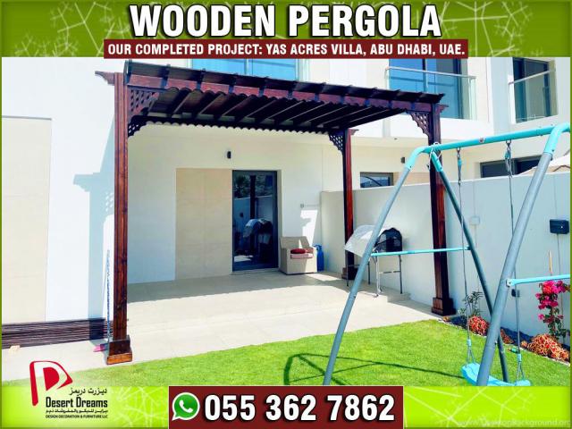 Wooden Slat Roof Pergola in Uae | Wall Attached Pergola | Pergola in Abu Dhabi.