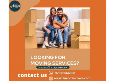Movers in JVT Dubai 0501566568 , BlueBox Movers and Packers with close truck.