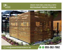 Restaurant Privacy Wooden Fences in Abu Dhabi | Solid Wood Fence Manufacturer.