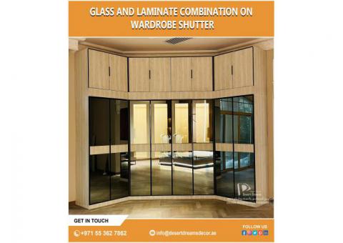 Glass and Laminate Combination on Wardrobes Shutter | Closets and Wardrobes Uae.