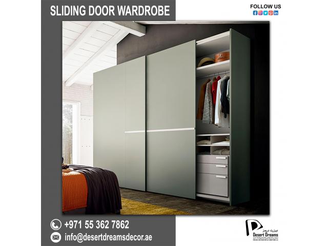 Glass and Laminate Combination on Wardrobes Shutter | Closets and Wardrobes Uae.